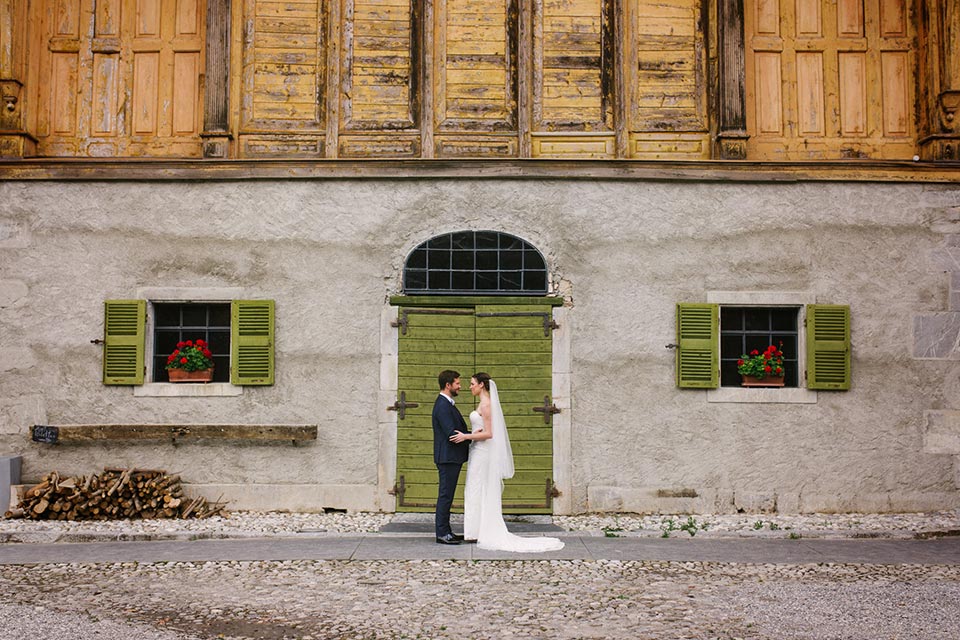 green door bride and groom