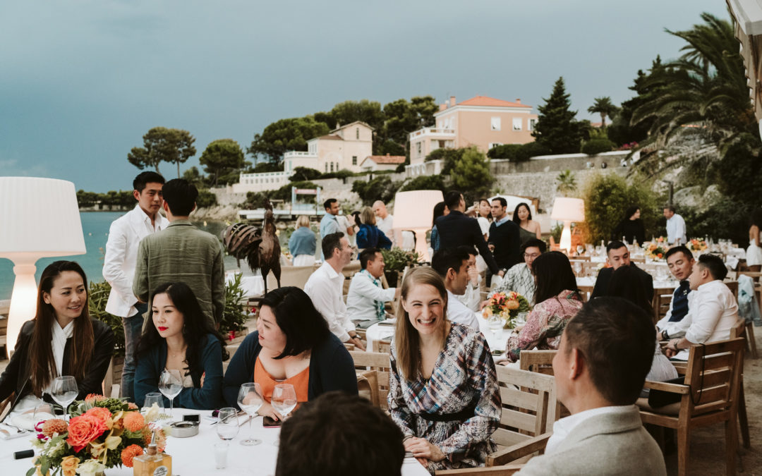 royal riviera welcome dinner guests happy beach tables